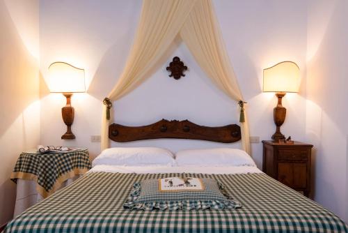 Katil atau katil-katil dalam bilik di Agriturismo La Rombaia