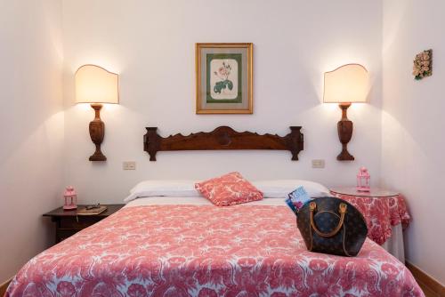 Katil atau katil-katil dalam bilik di Agriturismo La Rombaia