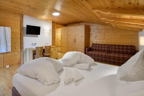 Ein Bett oder Betten in einem Zimmer der Unterkunft Walchauhof