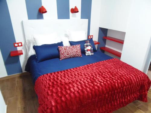 A bed or beds in a room at Apartamento en Triana