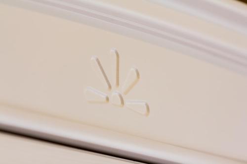 a close up view of a white door with a drawer at Hotel Terme Leonardo in Abano Terme