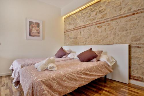 Postelja oz. postelje v sobi nastanitve La Quinta Hacienda