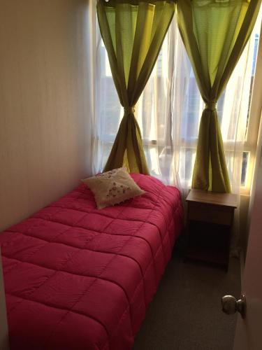 Кровать или кровати в номере Depto Marga Marga Quilpué