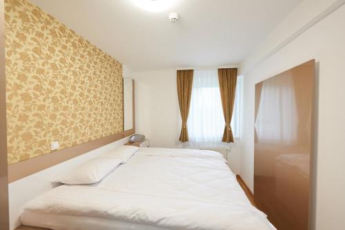 Park Apartment 객실 침대