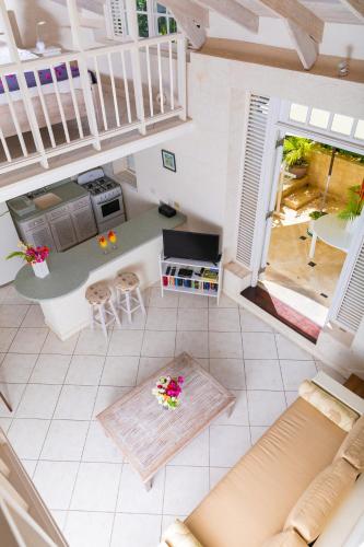 an overhead view of a living room and kitchen at Inchcape Seaside Villas in Christ Church