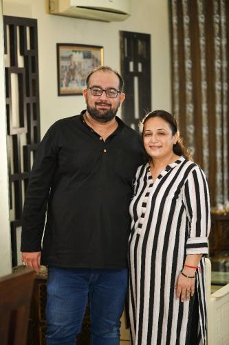 a man and a woman standing next to each other at Khas Mahal Homestay in Agra