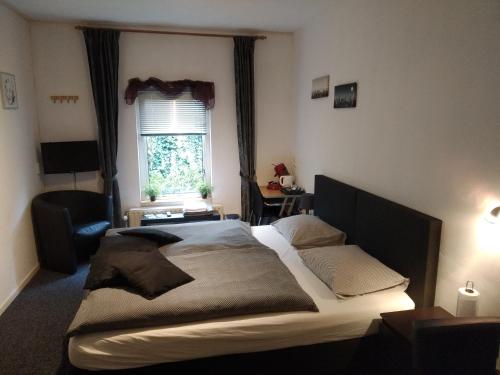 Postel nebo postele na pokoji v ubytování Bed & Breakfast Zuidlaren