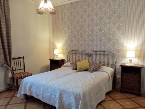 Кровать или кровати в номере Villa Calcasacco