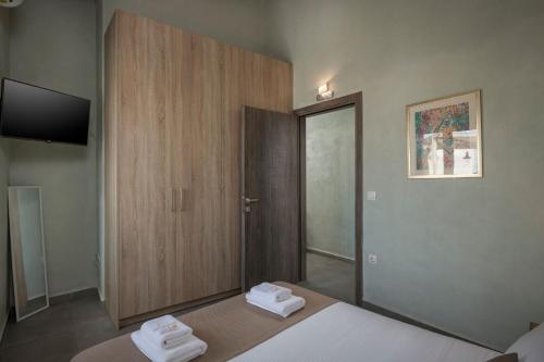 Ένα ή περισσότερα κρεβάτια σε δωμάτιο στο Villa Roxanne
