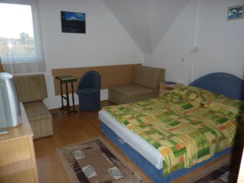 מיטה או מיטות בחדר ב-Bridgehaus