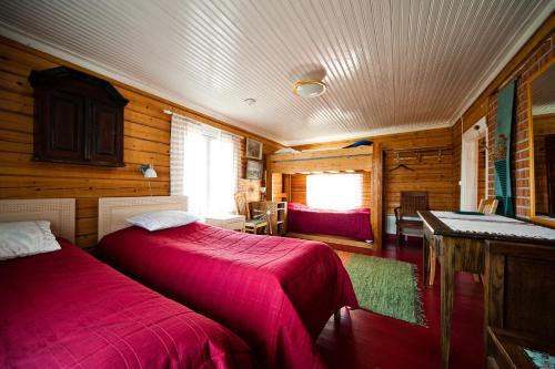Llit o llits en una habitació de Mäntylän Tila