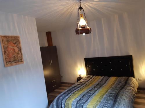 מיטה או מיטות בחדר ב-Repaire des Corsaires Normands