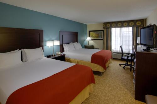 Ένα ή περισσότερα κρεβάτια σε δωμάτιο στο Holiday Inn Express Winston-Salem by IHG