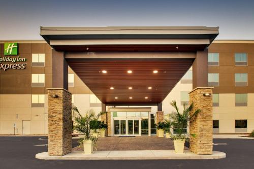 a lobby of a hotel with a large building at Holiday Inn Express - Lexington East - Winchester by IHG in Winchester