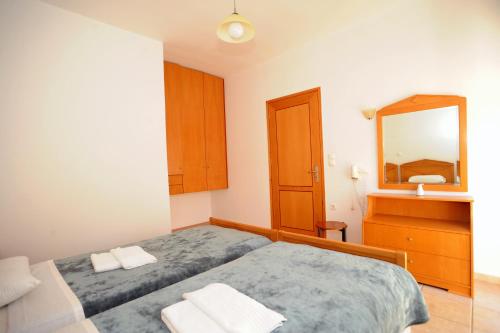 Postel nebo postele na pokoji v ubytování Evilion hotel