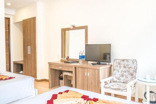 Una cama o camas en una habitación de Nice Dream Hotel
