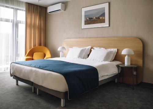 Кровать или кровати в номере KLEVER resort