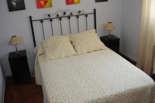 Ліжко або ліжка в номері Villa Cuesta