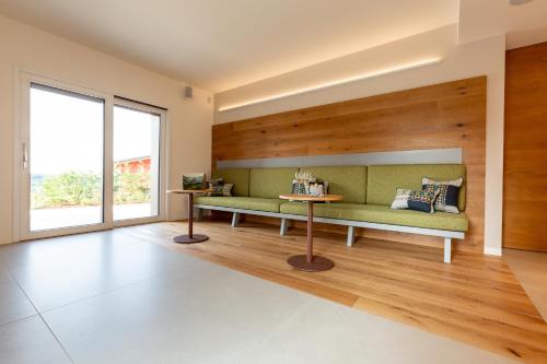 Гостиная зона в Relais Althea Azienda Agrituristica