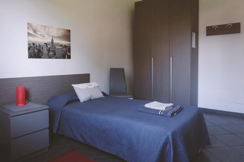 Posteľ alebo postele v izbe v ubytovaní B&B Gli Olmi