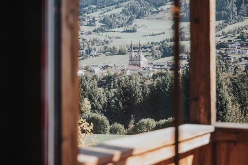 a view from a window of a village at Appartements Wieshof in Sankt Johann im Pongau