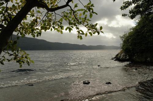 a view of a body of water with mountains at Morlea Bed & Breakfast in Drumnadrochit