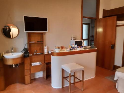 TV a/nebo společenská místnost v ubytování B&B Parco Antico