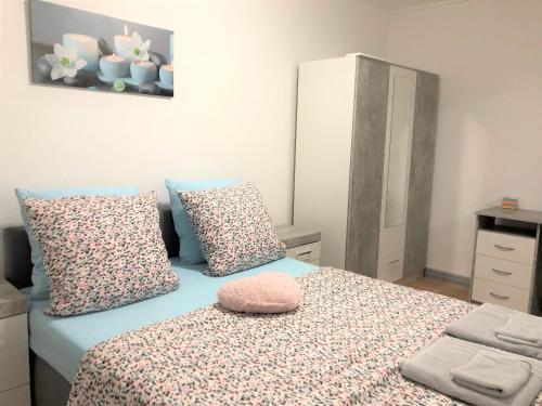 Postel nebo postele na pokoji v ubytování Comfort Stay Basel Airport RC46B