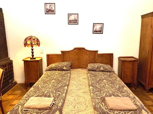 En eller flere senge i et værelse på Apartments in the Customs Square
