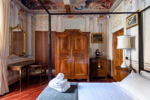 Domus Nannini SPA - Palazzo Nanniniにあるベッド