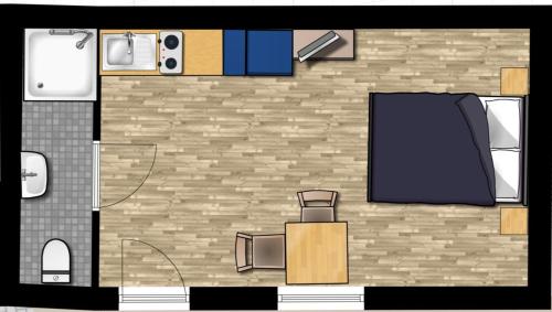 a floor plan of a room with a roomlayout at Apartment Airport in Cologne