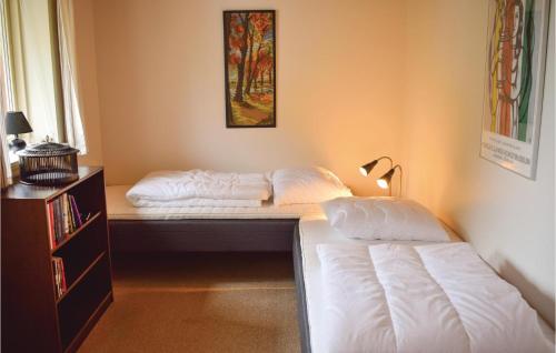 Katil atau katil-katil dalam bilik di Two-Bedroom Holiday Home In Humble
