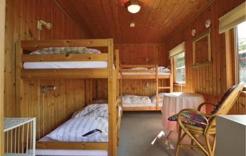 En eller flere køjesenge i et værelse på Nice Home In Eskebjerg With 3 Bedrooms And Wifi