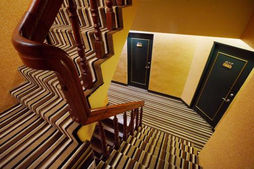 an overhead view of a staircase in a building at Happy Hotel in Kaohsiung