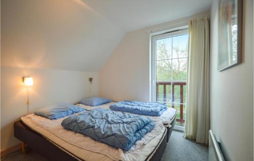 Ένα ή περισσότερα κρεβάτια σε δωμάτιο στο 3 Bedroom Pet Friendly Home In Rm