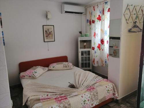 Llit o llits en una habitació de Apartment Quiet Bay