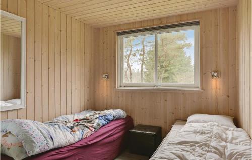 Postelja oz. postelje v sobi nastanitve Beautiful Home In Blvand With Sauna, Wifi And Indoor Swimming Pool