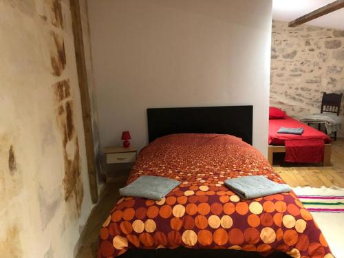 Ліжко або ліжка в номері Superbe Duplex aux Arenes
