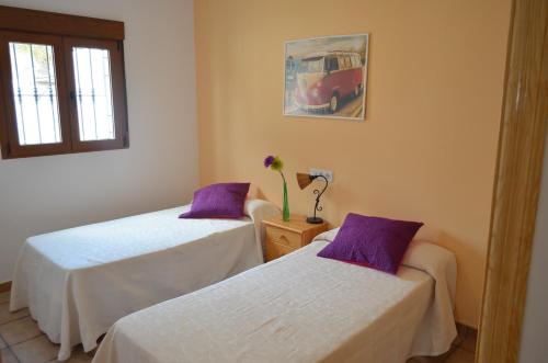 Ένα ή περισσότερα κρεβάτια σε δωμάτιο στο Casas la Noria