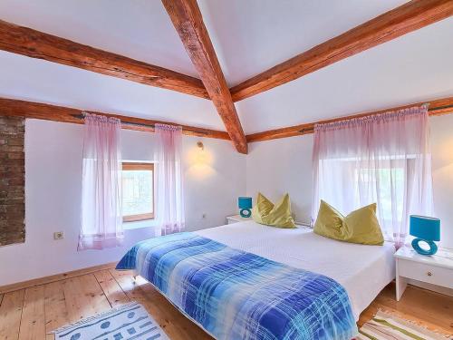 Postel nebo postele na pokoji v ubytování Villas Aurelia