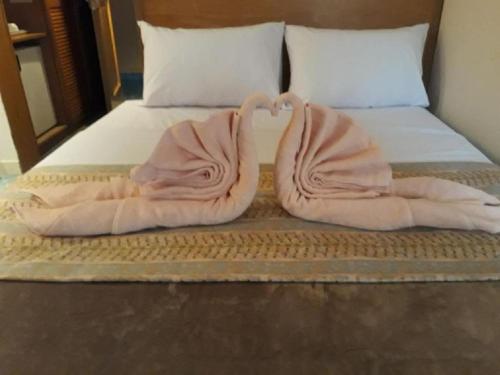 Ένα ή περισσότερα κρεβάτια σε δωμάτιο στο Terrace Hotel