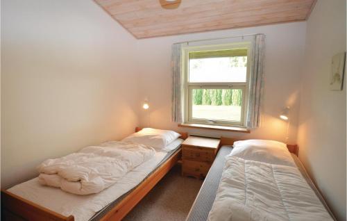 Postel nebo postele na pokoji v ubytování Stunning Home In Vggerlse With Kitchen
