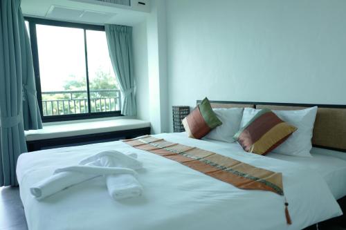 Cama o camas de una habitación en Sunset Bay View Phuket