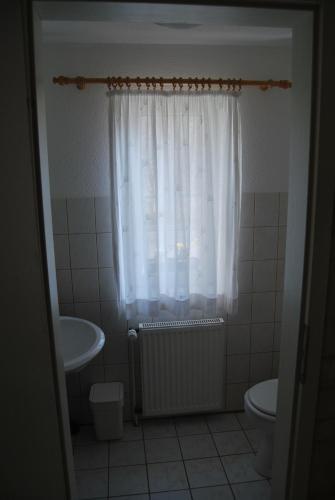 Koupelna v ubytování Ferienwohnungen Stricker Harz