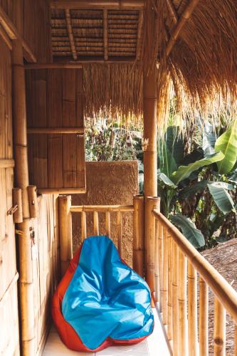 Фотография из галереи BALI BAMBOO JUNGLE HUTS AND HOSTEL в городе Tampaksiring
