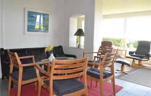  Amazing home in Grenaa with 8 Bedrooms, WiFi and Indoor swimming pool -  Room  picture :   Tea/Coffee maker    Shower    TV                           