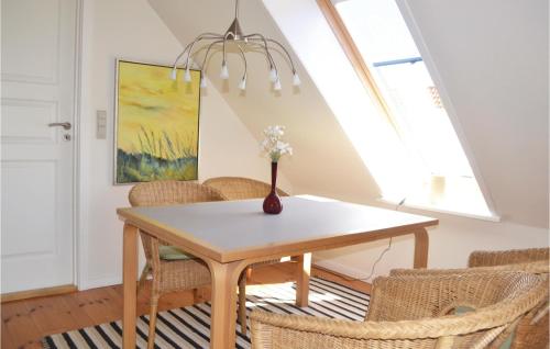  Amazing home in Grenaa with 8 Bedrooms, WiFi and Indoor swimming pool -  Room  picture :   Tea/Coffee maker    Shower    TV                           