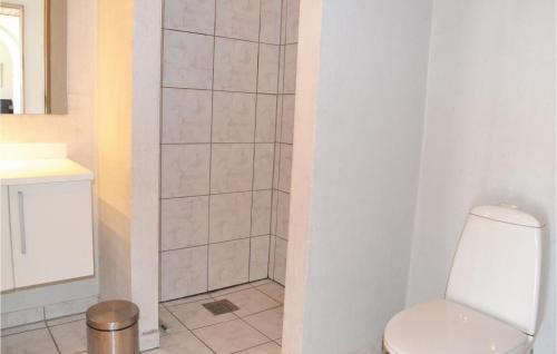  Amazing home in Grenaa with 8 Bedrooms, WiFi and Indoor swimming pool -  Room  picture :   Tea/Coffee maker    Shower    TV                           