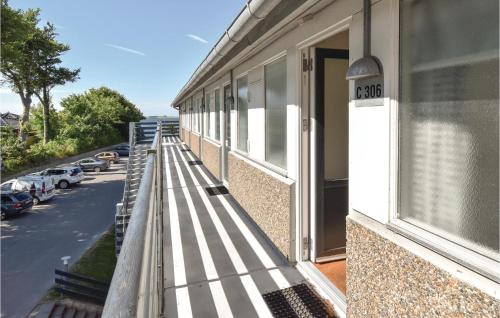 a balcony with a sign on the side of a building at Amazing Apartment In Faaborg With Wifi in Faaborg