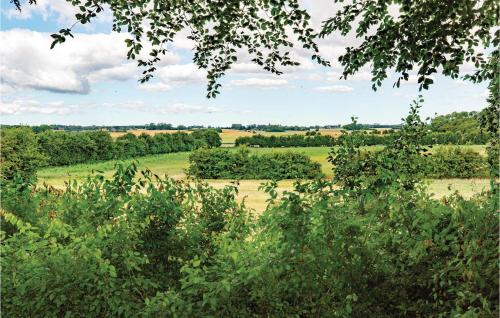 a view of a field from a tree at Holiday Home Enøvej Rude I in Rude